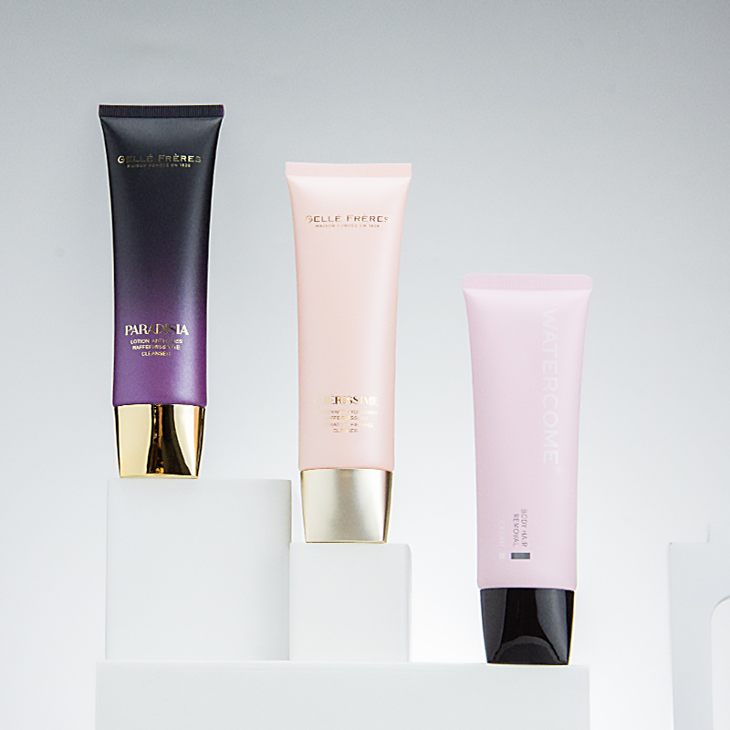 Gold plated rotating cap plastic tube